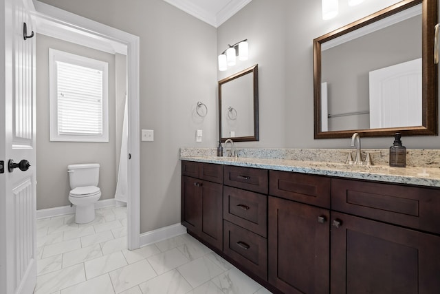 bathroom with marble finish floor, baseboards, ornamental molding, and a sink