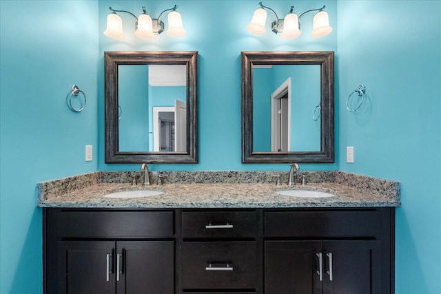 bathroom with double vanity and a sink