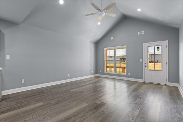 unfurnished living room featuring ceiling fan, high vaulted ceiling, dark wood-type flooring, visible vents, and baseboards