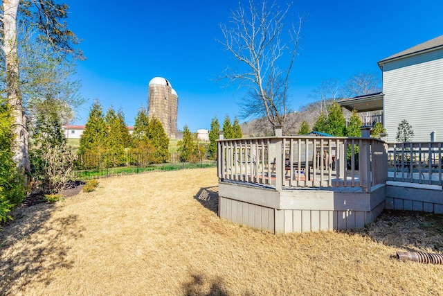 view of yard featuring a wooden deck