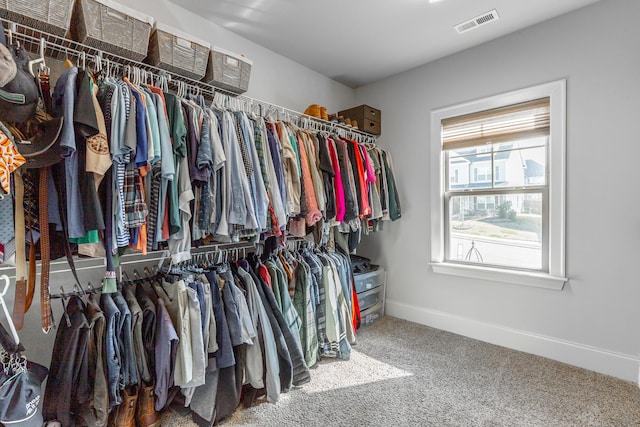 spacious closet with visible vents and carpet flooring