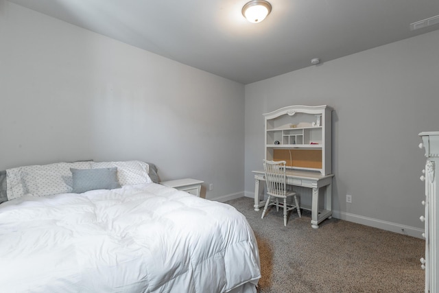 carpeted bedroom with baseboards and visible vents