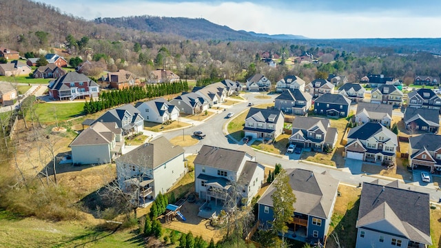 drone / aerial view featuring a mountain view and a residential view