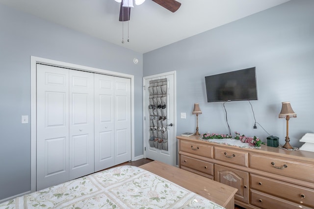 bedroom featuring a closet and a ceiling fan