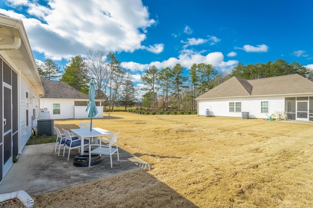 view of yard featuring a patio area and cooling unit