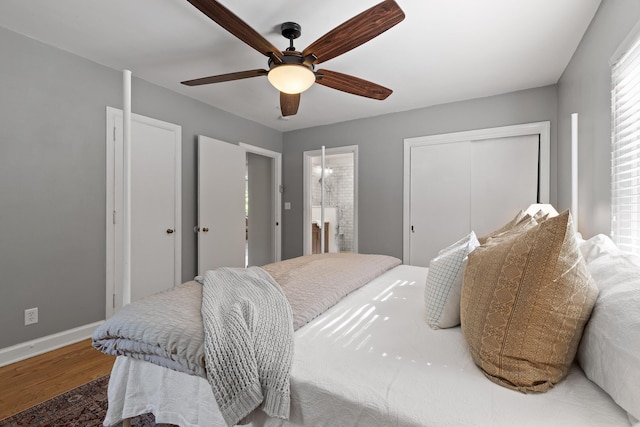 1723 Hixson Pike, Chattanooga, TN 37405 - bedroom featuring a closet, wood finished floors, baseboards, ensuite bathroom, and ceiling fan