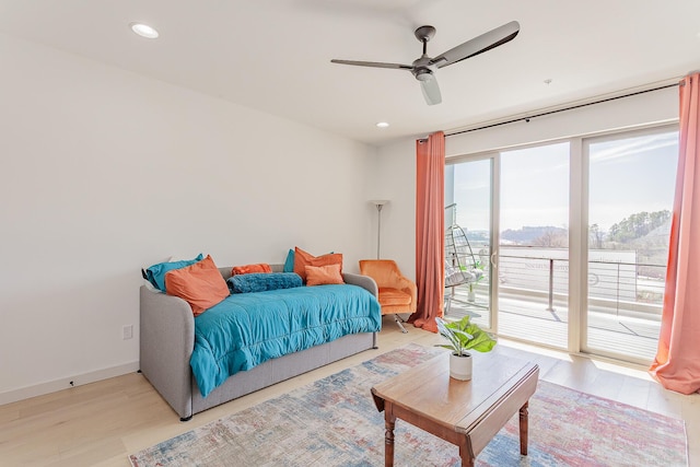 bedroom featuring light wood finished floors, baseboards, ceiling fan, access to exterior, and recessed lighting