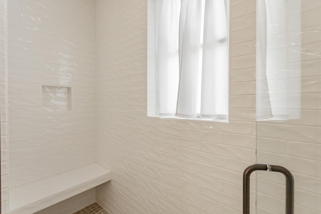 full bathroom featuring a stall shower