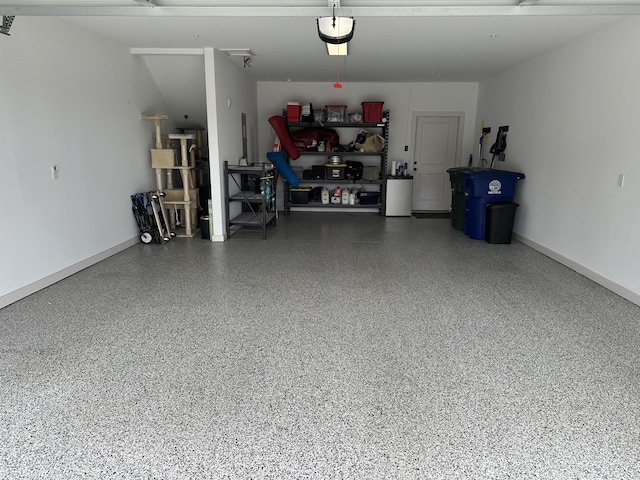 garage featuring baseboards