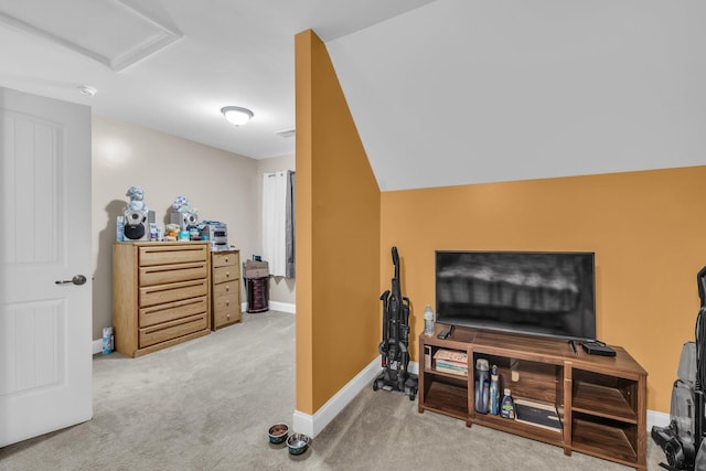 interior space featuring attic access and baseboards