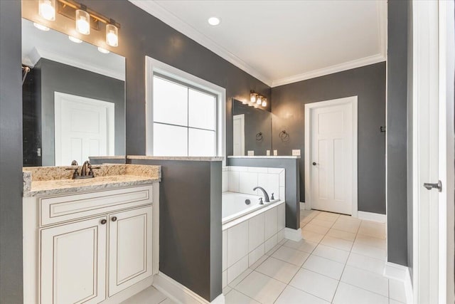 bathroom featuring vanity, baseboards, ornamental molding, tile patterned floors, and a bath