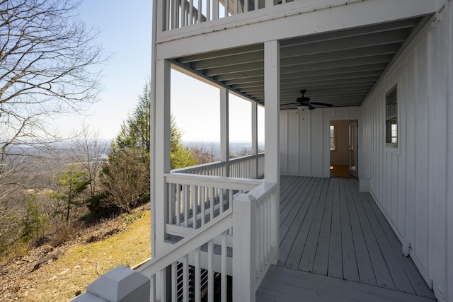 wooden terrace with ceiling fan