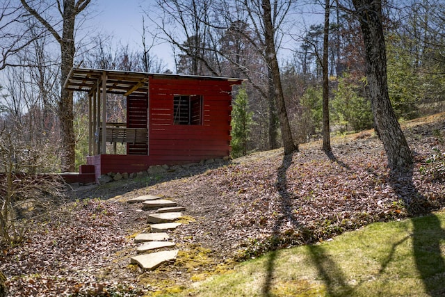 exterior space featuring an outdoor structure and exterior structure