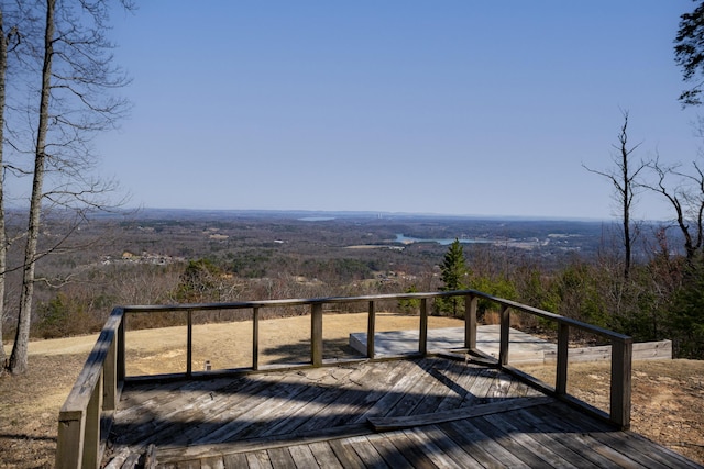 wooden terrace with a forest view