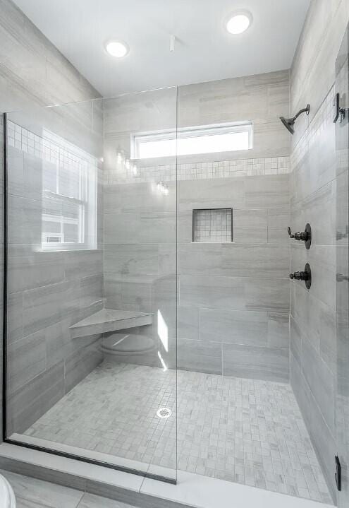 bathroom with a stall shower