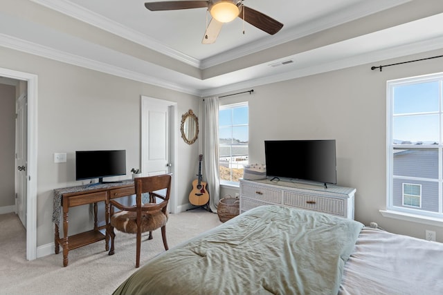 bedroom with baseboards, crown molding, visible vents, and light colored carpet