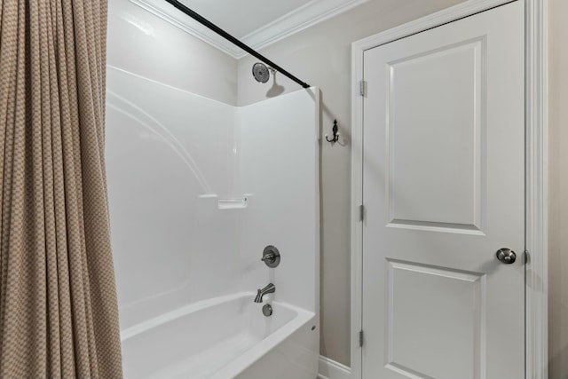 bathroom with shower / bathtub combination with curtain and crown molding