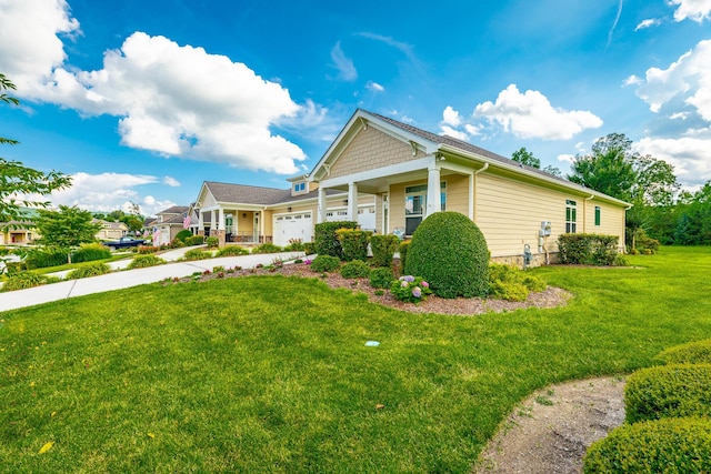 4581 Sweet Berry Ln, Ooltewah, TN 37363 - view of front of house with concrete driveway, a front lawn, and an attached garage