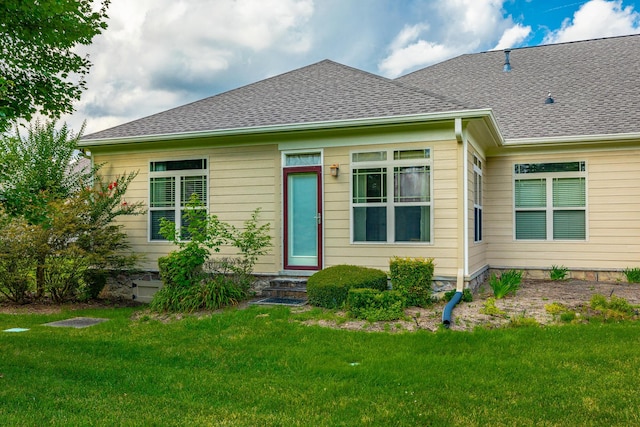 4581 Sweet Berry Ln, Ooltewah, TN 37363 - rear view of house with entry steps, a yard, and roof with shingles