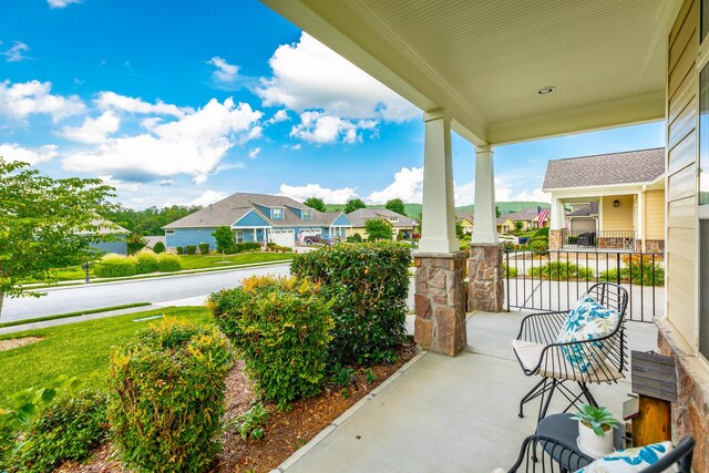 4581 Sweet Berry Ln, Ooltewah, TN 37363 - covered porch with a residential view