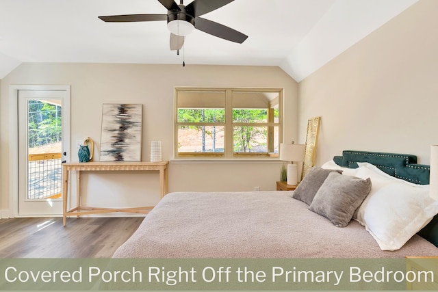 bedroom featuring access to exterior, a ceiling fan, vaulted ceiling, and wood finished floors