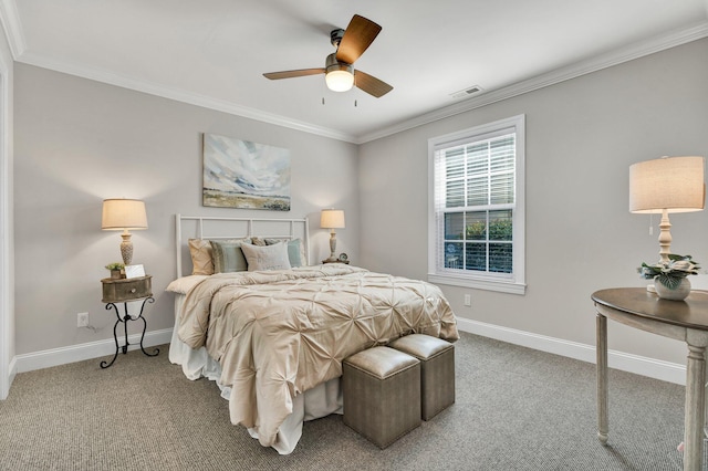 bedroom with crown molding, carpet, and baseboards