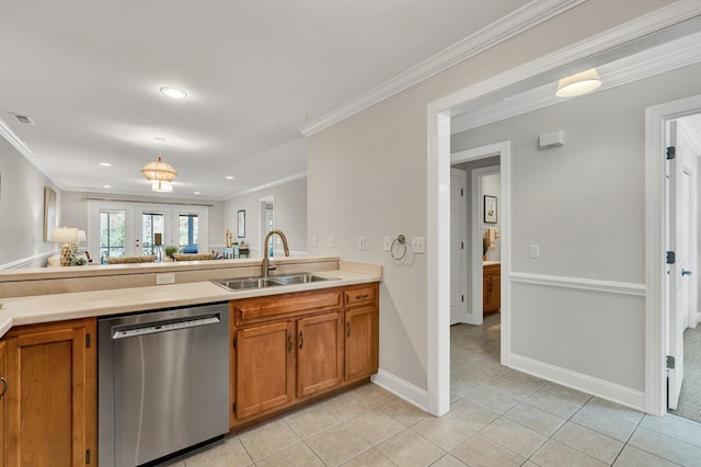 kitchen with visible vents, ornamental molding, brown cabinets, stainless steel dishwasher, and a sink