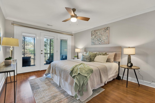 bedroom featuring access to exterior, visible vents, crown molding, and wood finished floors