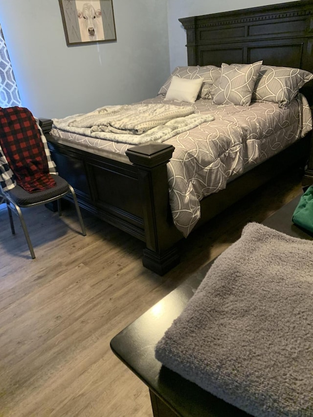 bedroom featuring light wood finished floors