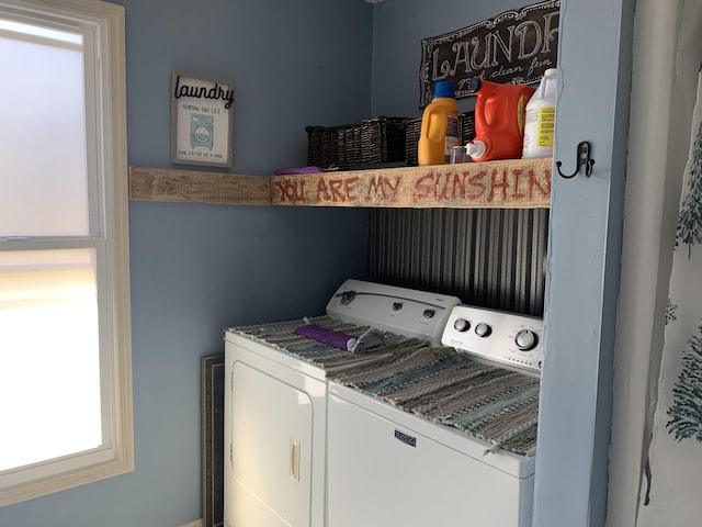 laundry area with laundry area and separate washer and dryer