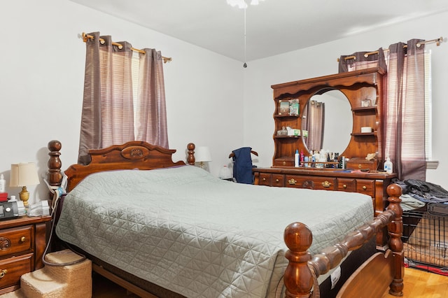 bedroom with wood finished floors