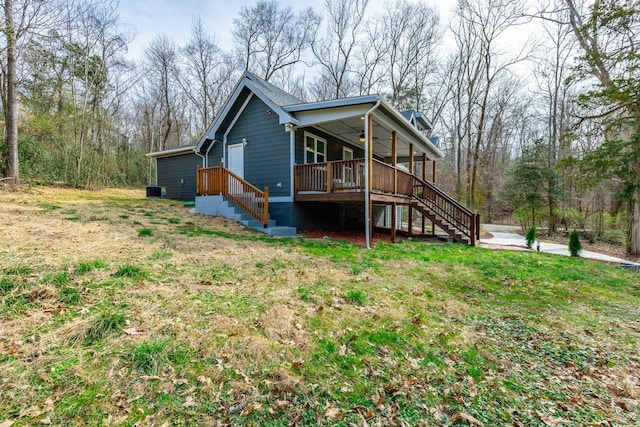 4513 Lamont Ln, Chattanooga, TN 37415 - view of property exterior featuring central air condition unit, a lawn, and stairs