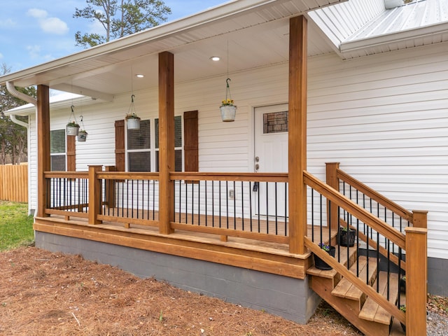 wooden deck featuring covered porch