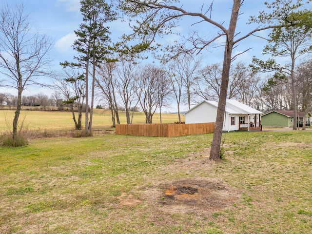 view of yard with fence