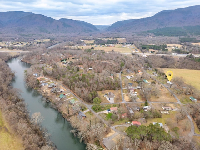 bird's eye view with a water and mountain view