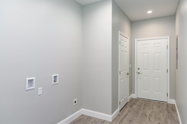 entryway featuring light wood-style flooring and baseboards