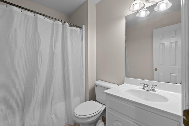 full bathroom with vanity, toilet, and a shower with curtain