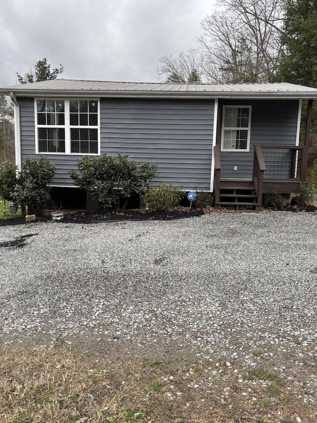 view of home's exterior featuring metal roof