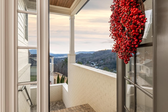 balcony featuring a mountain view