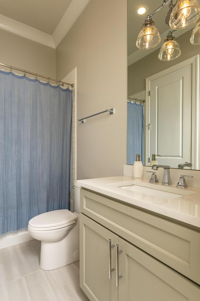 full bath with vanity, tile patterned floors, and toilet