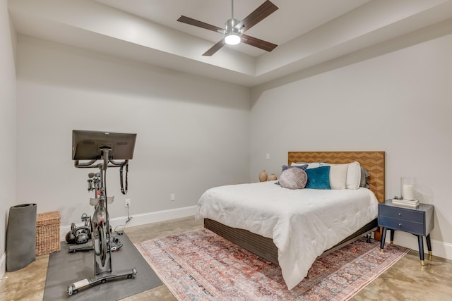 bedroom featuring a ceiling fan and baseboards