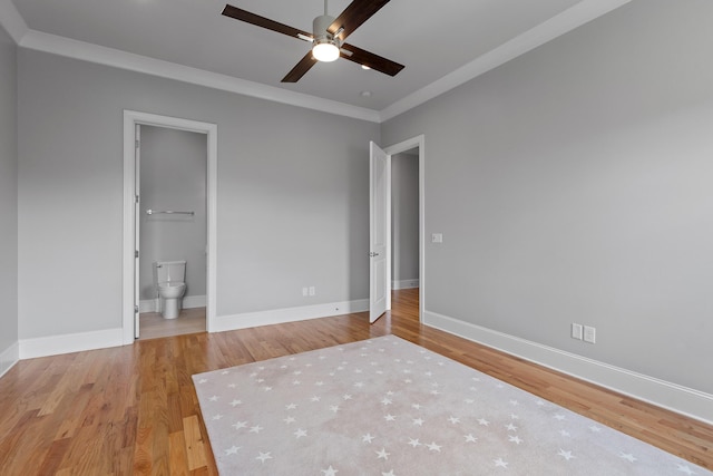 1109 Meroney St, Chattanooga, TN 37405 - unfurnished bedroom featuring wood finished floors, ornamental molding, connected bathroom, and ceiling fan