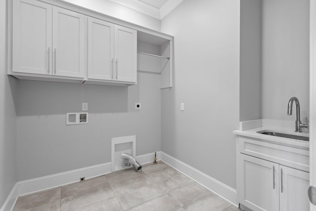 1109 Meroney St, Chattanooga, TN 37405 - laundry area with electric dryer hookup, washer hookup, cabinet space, hookup for a gas dryer, and light tile patterned flooring