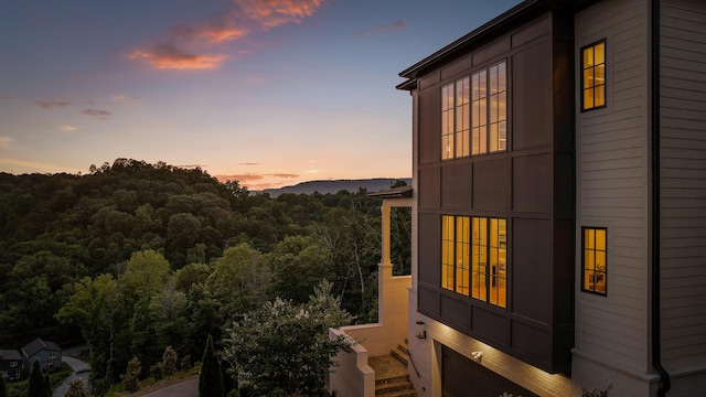 1109 Meroney St, Chattanooga, TN 37405 - view of side of home with a view of trees and board and batten siding