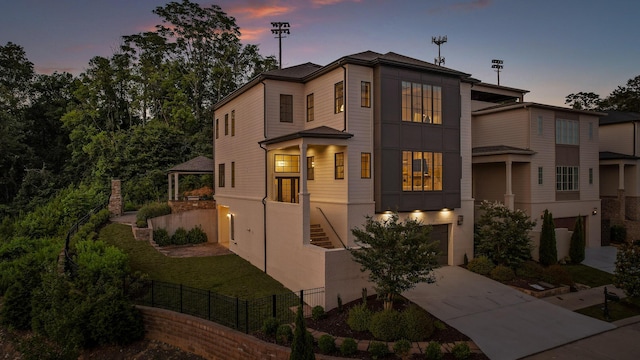 1109 Meroney St, Chattanooga, TN 37405 - view of front facade with concrete driveway and an attached garage