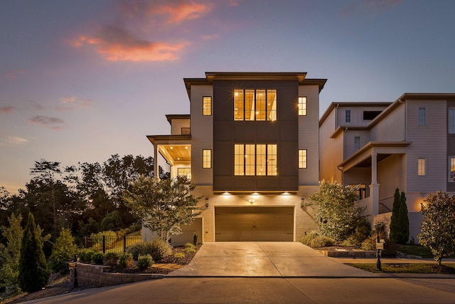 1109 Meroney St, Chattanooga, TN 37405 - modern home with stucco siding, driveway, and a garage