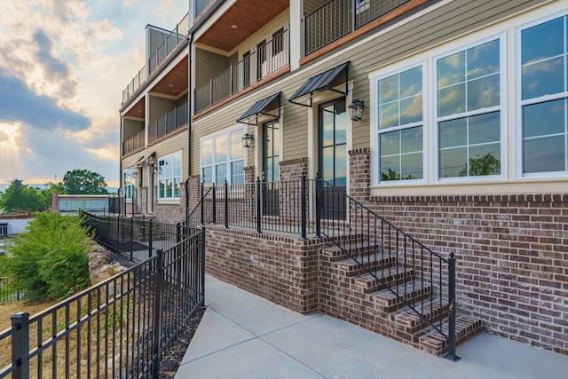 entrance to property with brick siding