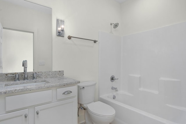 full bath with washtub / shower combination, vanity, and toilet