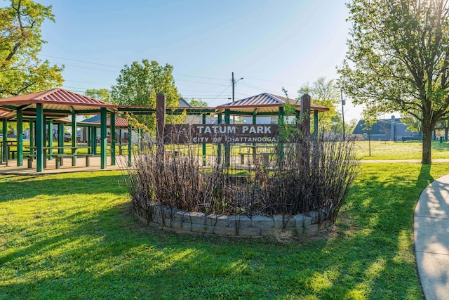 view of play area featuring a lawn and a gazebo