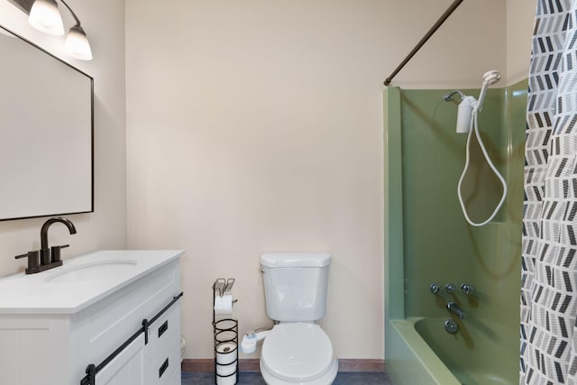 full bathroom featuring bathtub / shower combination, vanity, and toilet